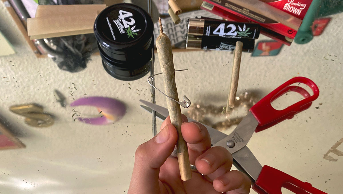 Make a hole in the bigger joint for the intersection of your cross joint.